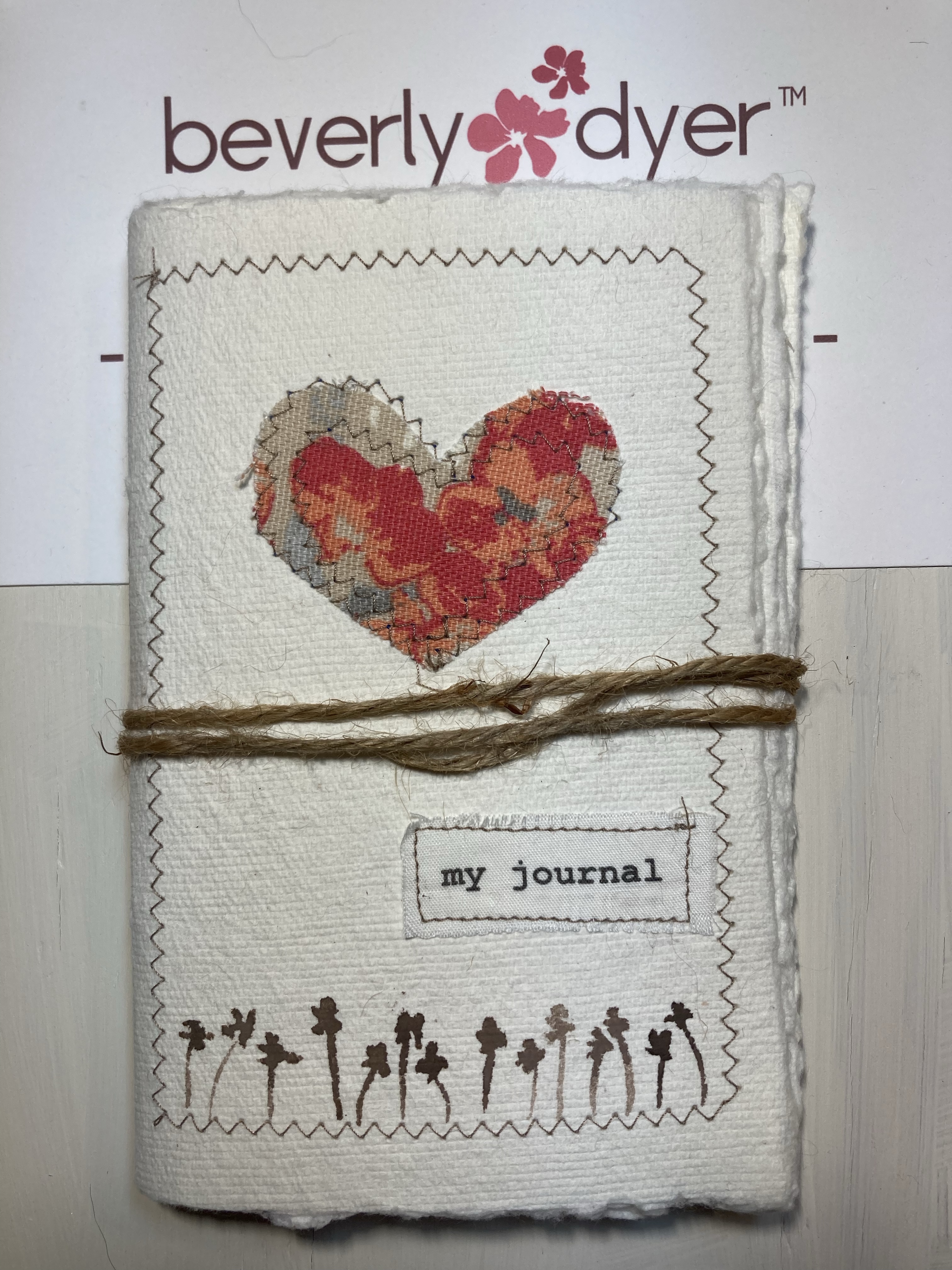 Hand-bound journals for art journaling, junk journaling, or writing.